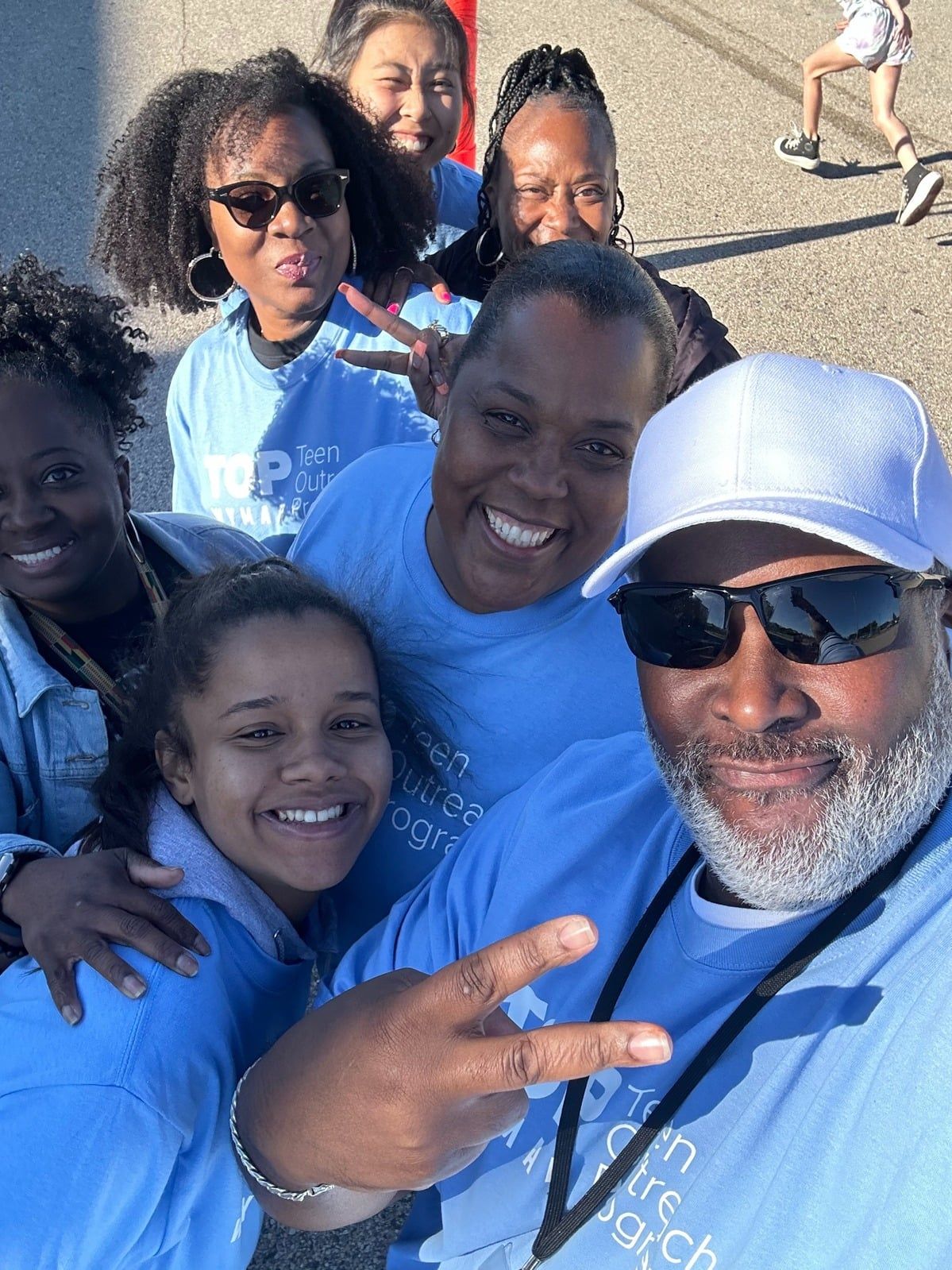 Urban Prep youth, families, and team members gathered together in their community